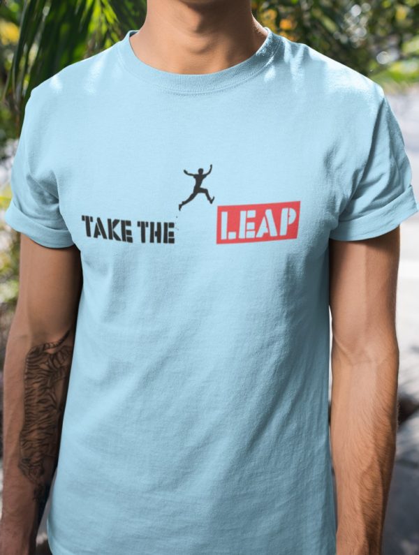 Take the leap tshirt design on a blue shirt.