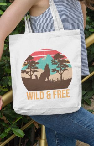 wild & free tote bag with howling wolf image