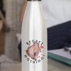 Regret nothing design printed on a water bottle.