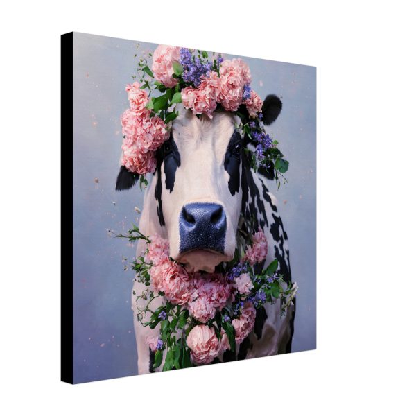 Cow draped in a bouquet of flowers.